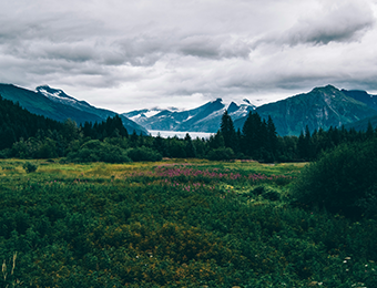 Glacier lake with mountains in the background