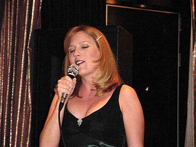 Lenore sings for the poker players